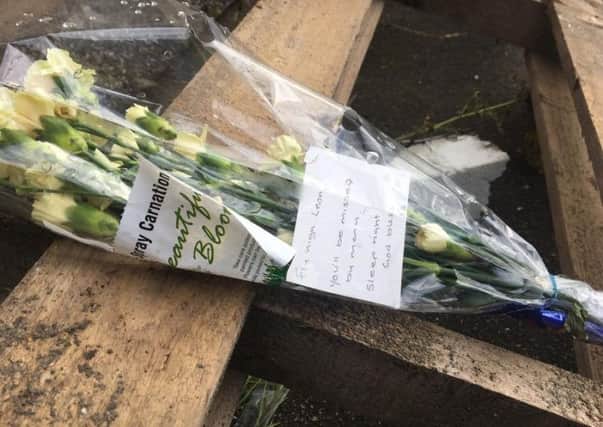 Flowers have been laid in tribute to Leon Hoyle from Lancaster.