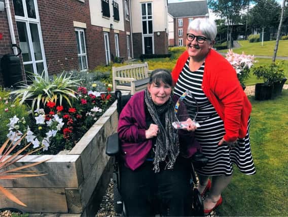 Donna Quarmby with one of the residents at The Grange in Buckshaw Retirement Village