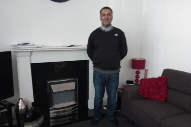 Naaman Member, 50, in his living room in Skeffington Road, Preston, where The Beatles once played