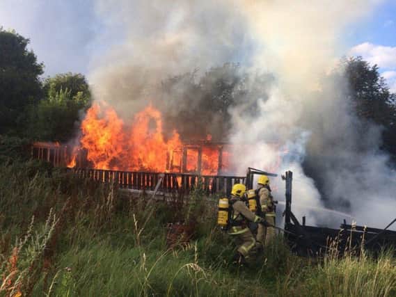 Crews tackle a caravan fire in Carnforth