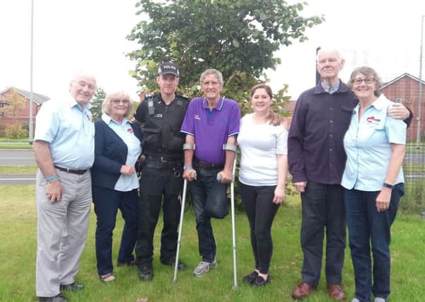 Good Deeds Trust volunteers Terry and his wife Pat Daly, Chorley police sergeant Paul Harrison, Dementia sufferer Neil Rushton with his daughter Lindsay Moys and Dementia sufferer Roger with his wife Anne Tunnicliff.  Dementia Buddy scheme in Chorley