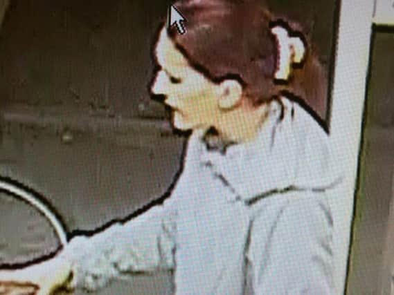 Police want to speak to this woman after an Asian security guard was racially abused