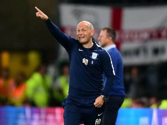 Alex Neil dishes out instructions at Pride Park.