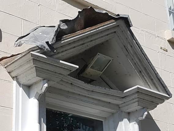 The damaged porch roof at Arkwright House