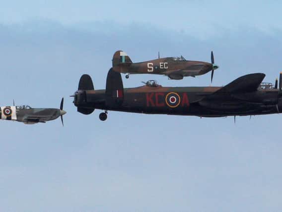 The Battle of Britain Memorial Flight including a Lancaster bomber, a Spitfire and a Hurricane
