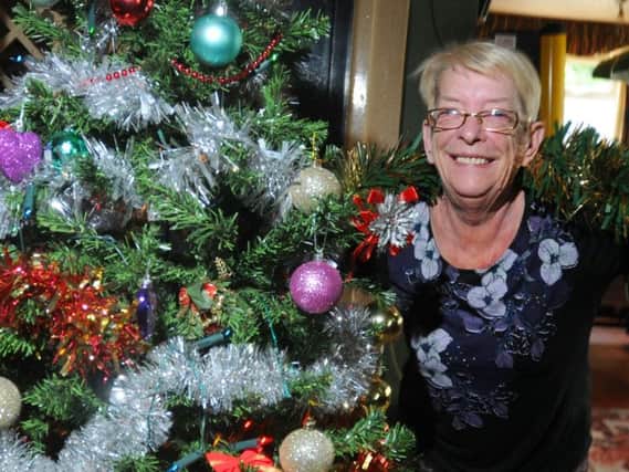 Landlady Marilyn McDonnell is giving the Sumpter Horse a final farewell