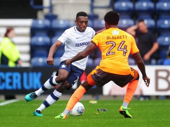 Darnell Fisher in action for Preston against Reading.