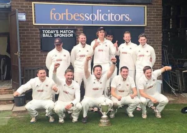 Garstang celebrate their Meyler Cup victory against Vernon Carus