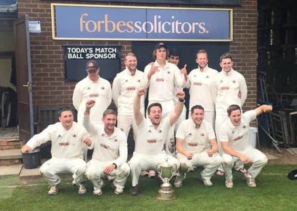 Garstang celebrate their Meyler Cup victory against Vernon Carus