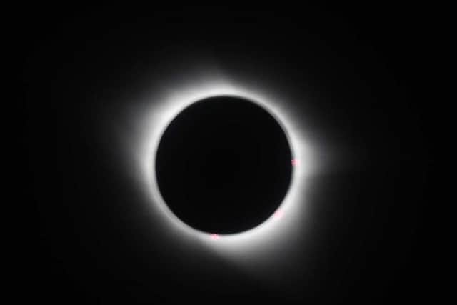 The total eclipse of the sun as viewed from onboard Virgin Atlantic Boeing 787 Dreamliner flight VS5 from London's Heathrow airport to Miami