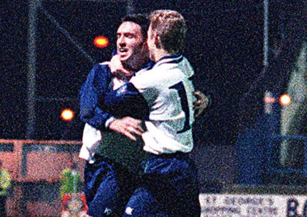 Lee Ashcroft celebrates with Lee Cartwright after scoring a hat-trick against Fulham back in 1997.