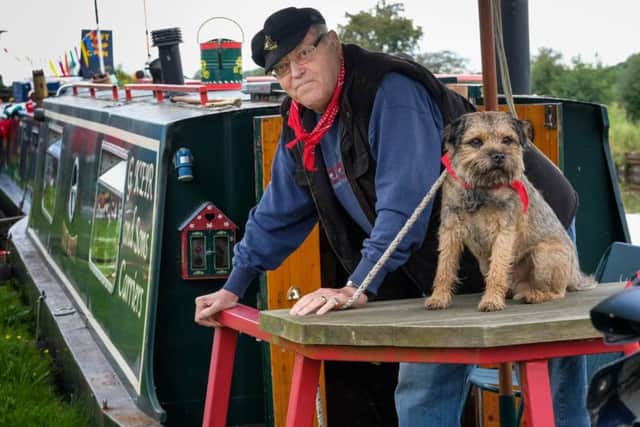 Pictures Martin Bostock. Canal Fest at Botany Bay, Chorley. Graham Keir and Billy aboard the Cut Butty.
