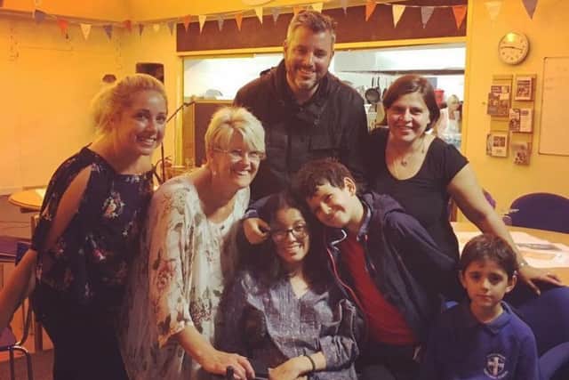 From left Kelly Louise Smith, Sharon Jackson, founder of the Neuro Centre with Nayeli Cookson, centre, Guy Cookson, above and sons Oscar and Mateo and a family friend.