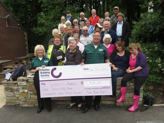Chorleys Angels First Aid Community Group have been handed a cheque for 1,930 from the Find Your Feet Walking Group