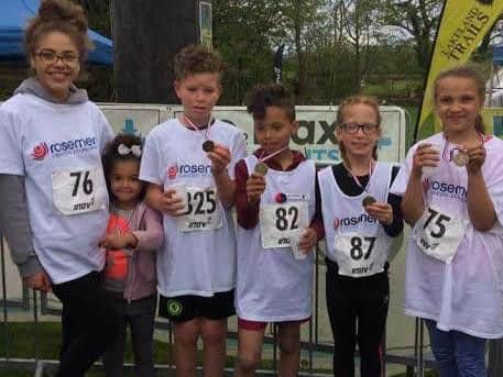 Louise Finch's family members Macy, Anaiya, Harrison, Mason, Isabelle and Jessica take part in the children's race for Rosemere Cancer Foundation