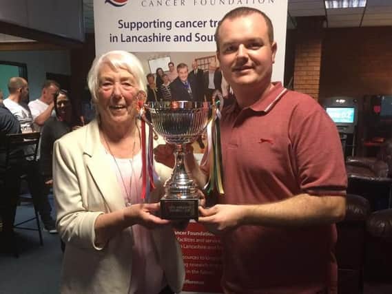 Last year's event - Tony' Forgione's wife Maureen presented the winners cup to Chris Norbury at the charity snooker match for Rosemere Cancer Foundation