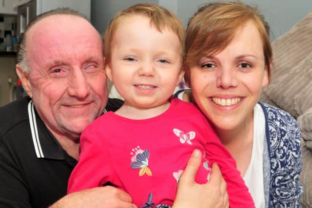 Jorgie Rae-Griffiths with dad Barry Griffiths and mum Lauren McCabe at home on Station Road, Wesham