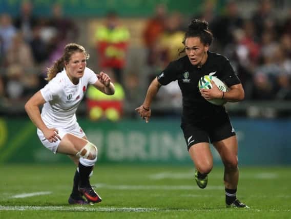 England's Lydia Thompson (left) and  New Zealand's Portia Woodman during the 2017 Women's World Cup Final