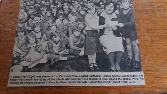 Leyland Methodist Infants School pupils Howard Irving and Sharon Miller present a cheque for Â£1,000 to Pat Seed in 1978