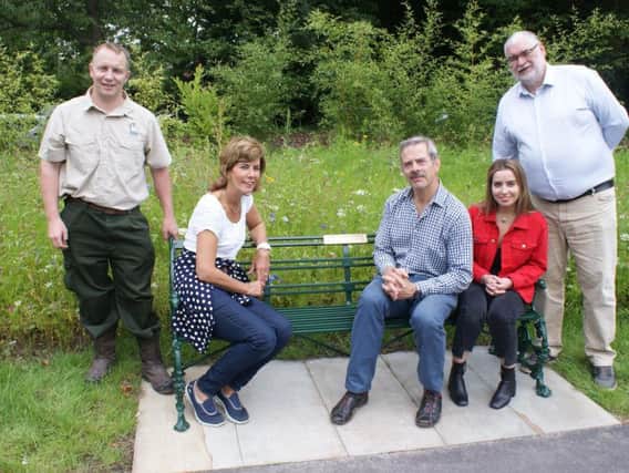 The Halewood Family with coun Robert Boswell on their memorial bench for Horace Holland Halewood