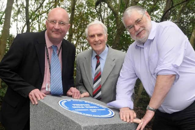 From left, Marcus Johnstone of Lancashire County Council, Peter Ward and Councillor Robert Boswell of Preston Council with the new Guild Wheel Plaque