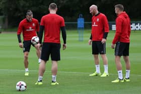 Wales' Gareth Bale (left) and James Collins (centre, right) during a training session ahead of their World Cup qualifier against Austria