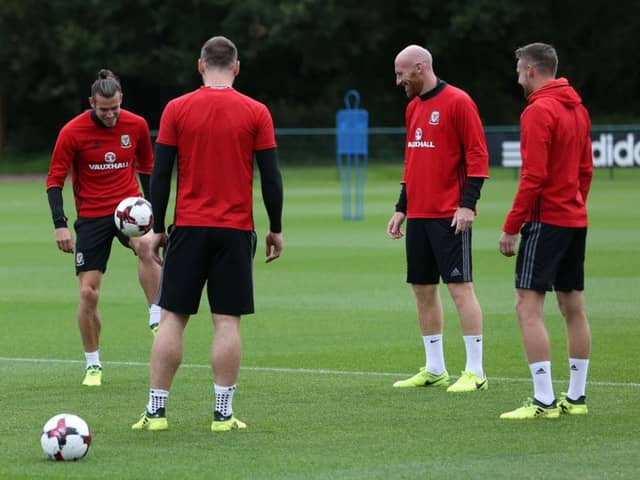 Wales' Gareth Bale (left) and James Collins (centre, right) during a training session ahead of their World Cup qualifier against Austria