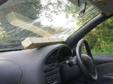 The piece of timber smashed through David's windscreen
