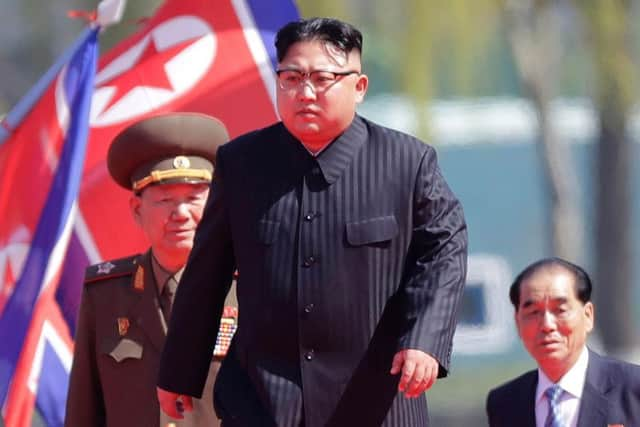 North Korean leader Kim Jong Un, centre