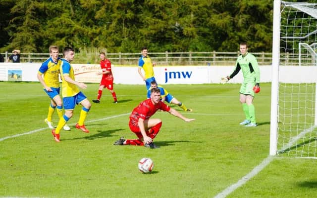 Brad Carsley is unable to apply the finishing touch against Ashton Athletic on Saturday