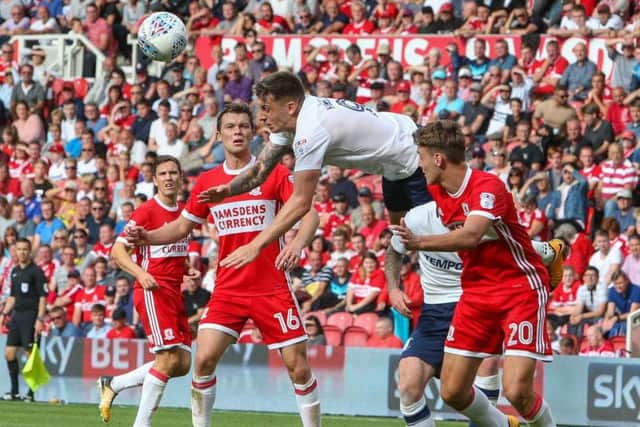 Jordan Hugill flies through the air in PNE's game at Middlesbrough