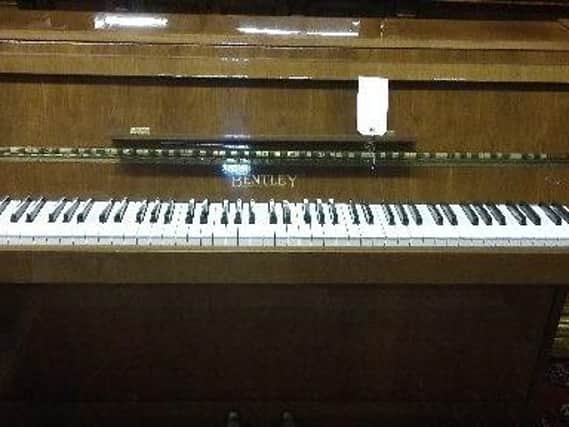 This Bentley piano is in immaculate condition