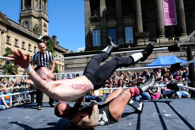 PCW wrestlers entertained crowds on the Flag Market last month