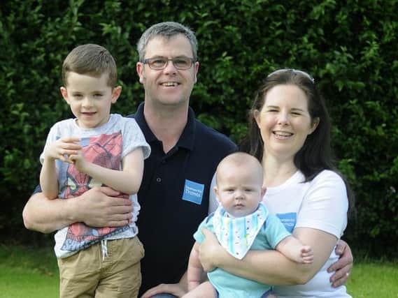 5-year-old Thomas Hudson at home after surgery with mum Jo Hudson, dad Lee Hudson and 6-month-old brother Matthew.
