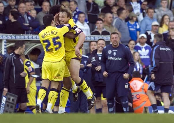 Paul McKenna celebrates with Ross Wallace after scoring Preston's equaliser at Birmingham in April 2009