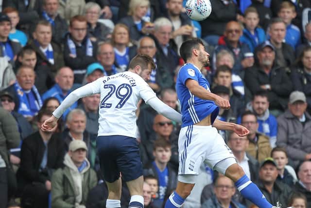 Tom Barkhuizen challenges in the air during PNE's win at Birmingham