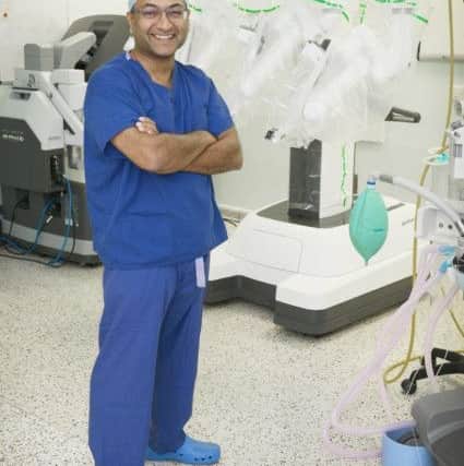 Arnab Bhowmick, divisional medical director of surgery at Lancashire Teaching Hospitals with the most advanced robotic surgeon, the DaVinci XI which is being funded by Rosemere Cancer Foundation's 20th anniversary appeal