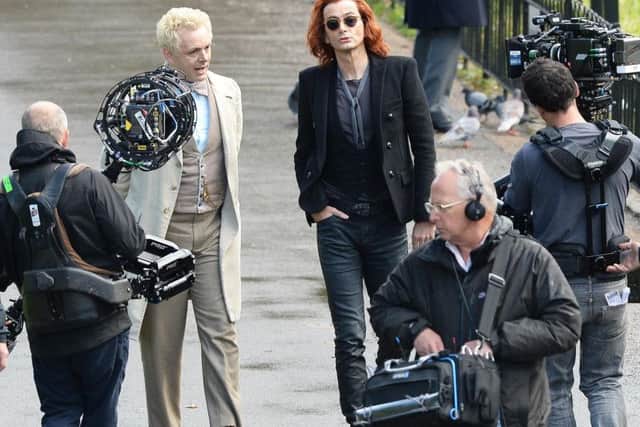 Filming a scene from Good Omens, based on the book by Terry Pratchett, in St James's Park central London.