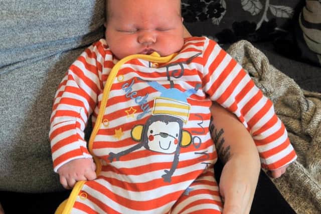 Theo Brown came into the world on September 6 weighing nearly twice the average of a newborn.PIC: SWNS