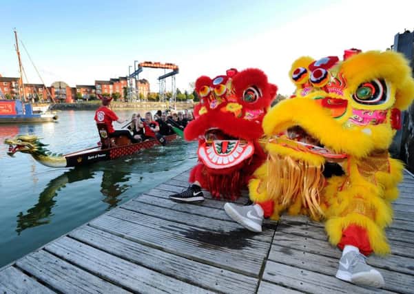 Chinese Lions add a dash of colour to the launch of Preston's new dragon boat