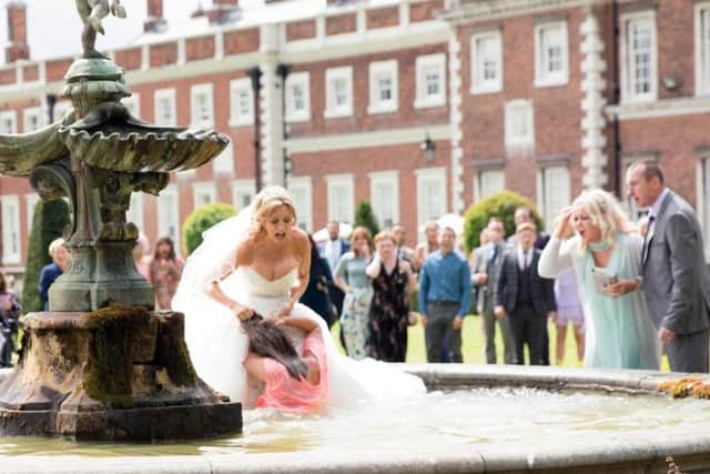 The fountain fight between Eva Price, played by Catherine Tyldesley, and Maria Connor, played by Samia Longchambon during Eva's wedding in the ITV1 soap, Coronation Street