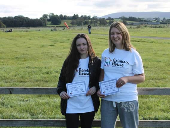 Megan Atkins and Gemma Bennett raised 1,100 for Rainbow House in Mawdesley by doing a sky dive