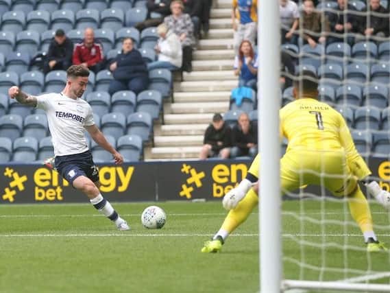 Sean Maguire goes for goal at Deepdale.