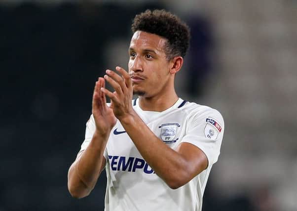 Match-winner Callum Robinson salutes the PNE fans at the final whistle.