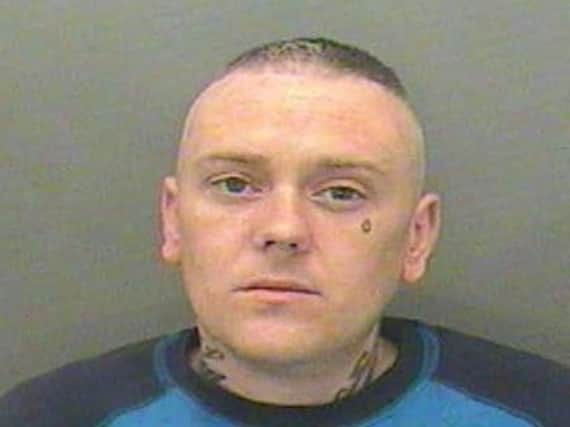 police want to trace Lee Kenyon in connection with both offences.