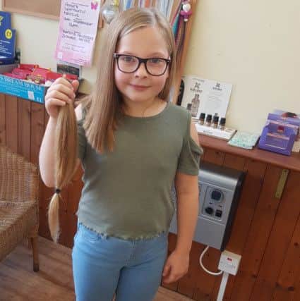 Amber Allen, 8, Gillibrand Primary School pupil has cut off her hair for the Little Princess Trust
