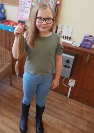 Amber Allen, 8, Gillibrand Primary School pupil has cut off her hair for the Little Princess Trust