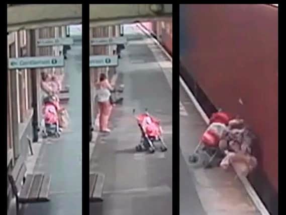 The 1.03-minute video ends with the mangled buggy and its contents strewn across the platform