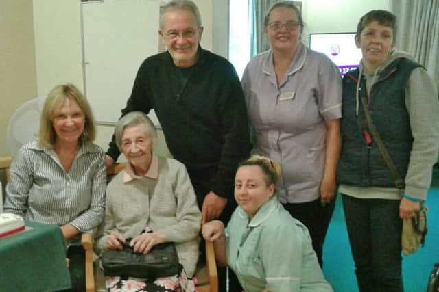 Winnie Walker celebrates her 104th birthday with staff at Chorley Lodge and her family