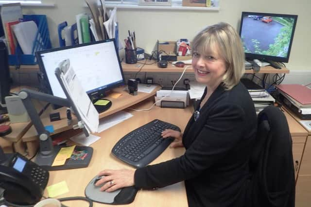 Sue Taylor at work in the Bishops House office